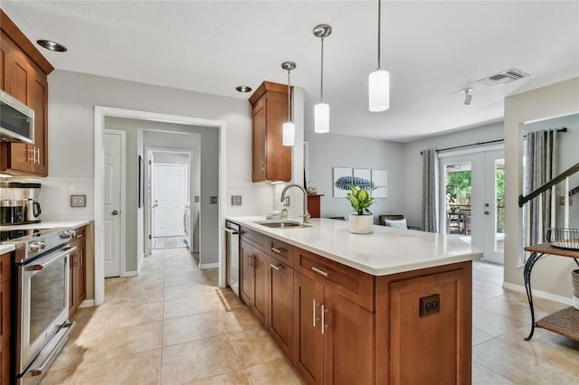 344 Cascade Ln, Palm Harbor, FL 34684 - kitchen with appliances with stainless steel finishes, backsplash, light countertops, light tile patterned flooring, and a peninsula