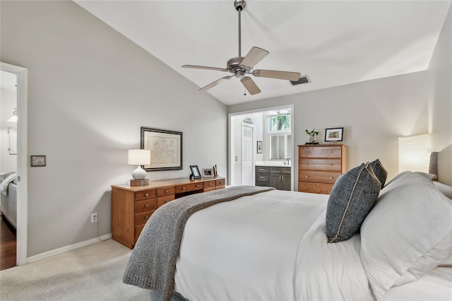 344 Cascade Ln, Palm Harbor, FL 34684 - bedroom featuring lofted ceiling, light colored carpet, connected bathroom, and a ceiling fan