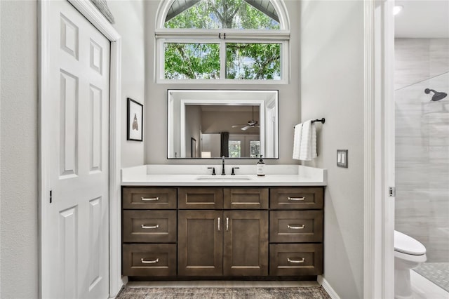 344 Cascade Ln, Palm Harbor, FL 34684 - bathroom featuring vanity and tiled shower