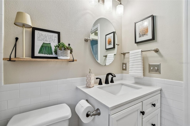344 Cascade Ln, Palm Harbor, FL 34684 - half bath with tile walls, wainscoting, and vanity