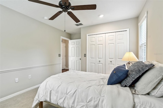 344 Cascade Ln, Palm Harbor, FL 34684 - bedroom with carpet, a closet, and ceiling fan