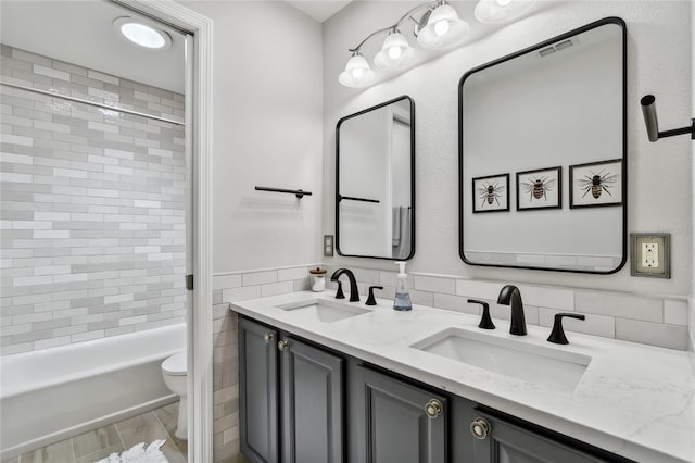 344 Cascade Ln, Palm Harbor, FL 34684 - full bathroom with double vanity and bathtub / shower combination