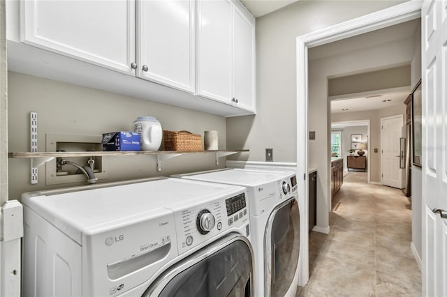 344 Cascade Ln, Palm Harbor, FL 34684 - laundry room with separate washer and dryer and cabinet space