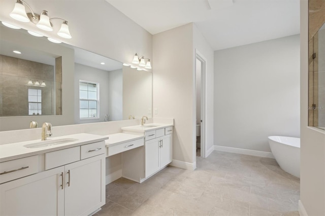 14531 Swiss Bridge Dr, Lithia, FL 33547 - full bathroom with vanity, a freestanding tub, and tiled shower