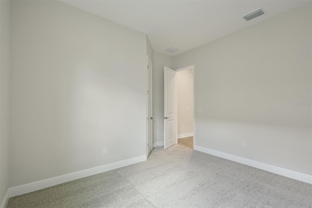 14531 Swiss Bridge Dr, Lithia, FL 33547 - empty room featuring light colored carpet and baseboards