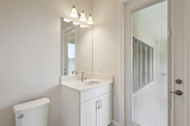 14531 Swiss Bridge Dr, Lithia, FL 33547 - bathroom with toilet and vanity