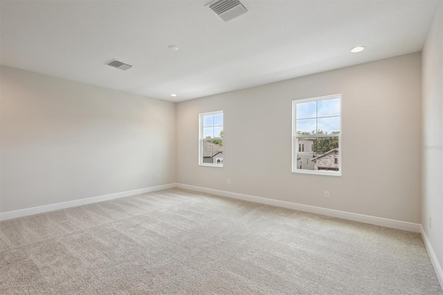 14531 Swiss Bridge Dr, Lithia, FL 33547 - unfurnished room featuring light carpet and recessed lighting