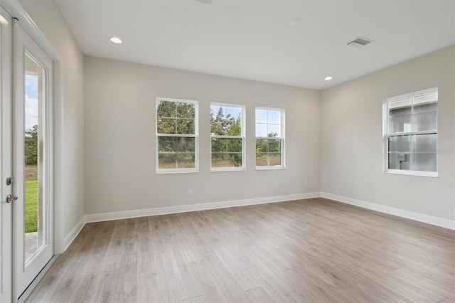14531 Swiss Bridge Dr, Lithia, FL 33547 - empty room featuring light wood-type flooring and recessed lighting