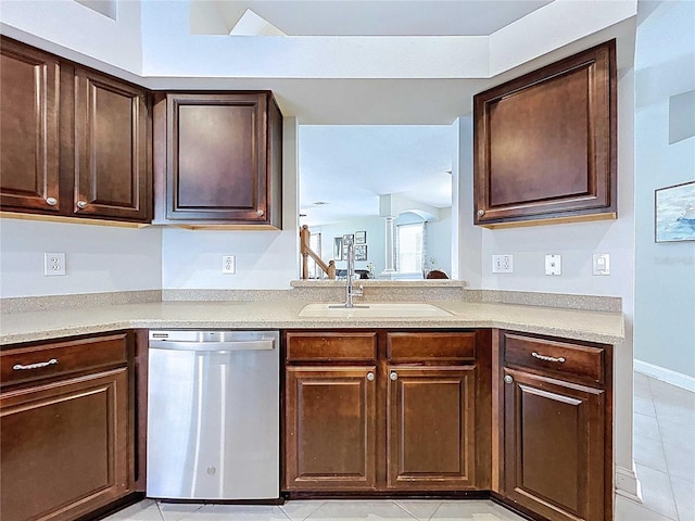 4116 Knollpoint Dr, Wesley Chapel, FL 33544 - kitchen featuring dishwasher, light tile patterned flooring, dark brown cabinetry, and light countertops