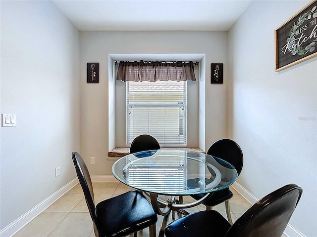4116 Knollpoint Dr, Wesley Chapel, FL 33544 - dining room with light tile patterned flooring and baseboards