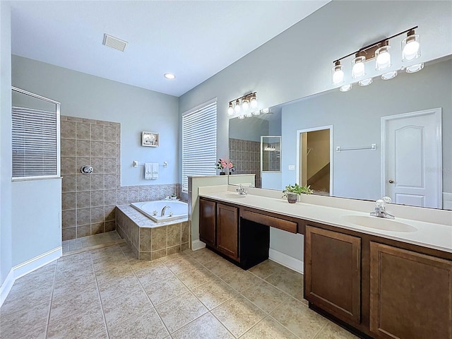 4116 Knollpoint Dr, Wesley Chapel, FL 33544 - full bathroom featuring walk in shower, double vanity, a bath, and tile patterned floors