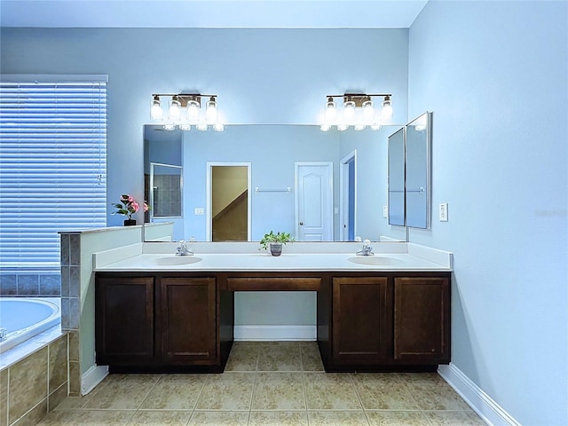 4116 Knollpoint Dr, Wesley Chapel, FL 33544 - full bath featuring double vanity, a bath, tile patterned floors, and a shower