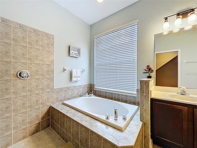 4116 Knollpoint Dr, Wesley Chapel, FL 33544 - full bathroom with a garden tub, vanity, plenty of natural light, and tiled shower