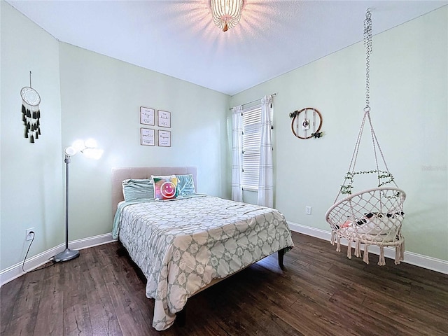 4116 Knollpoint Dr, Wesley Chapel, FL 33544 - bedroom with baseboards and dark wood-style flooring