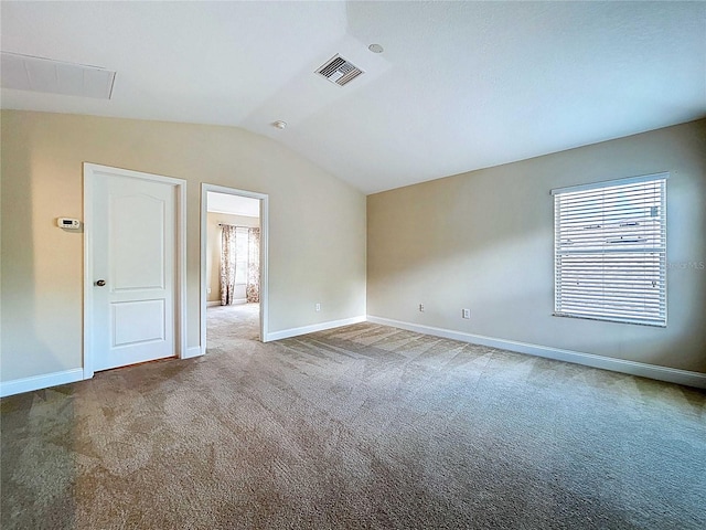 4116 Knollpoint Dr, Wesley Chapel, FL 33544 - empty room with carpet flooring and vaulted ceiling