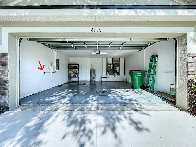 4116 Knollpoint Dr, Wesley Chapel, FL 33544 - garage with a garage door opener, electric panel, and electric water heater