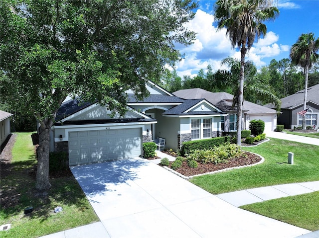 4116 Knollpoint Dr, Wesley Chapel, FL 33544 - single story home with stone siding, stucco siding, a front lawn, an attached garage, and driveway