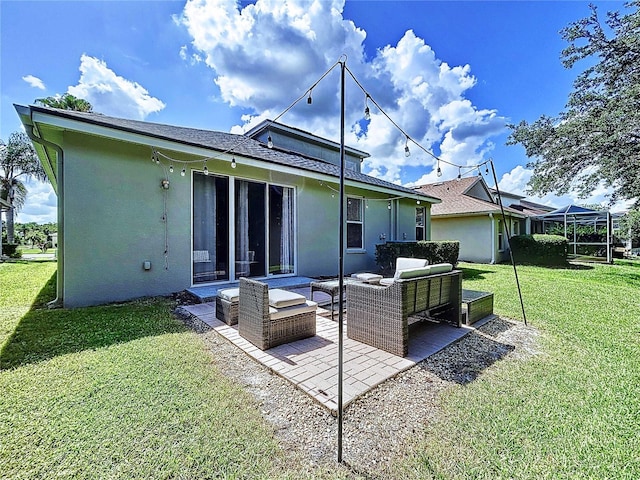 4116 Knollpoint Dr, Wesley Chapel, FL 33544 - back of house featuring stucco siding, outdoor lounge area, a lawn, and a patio area