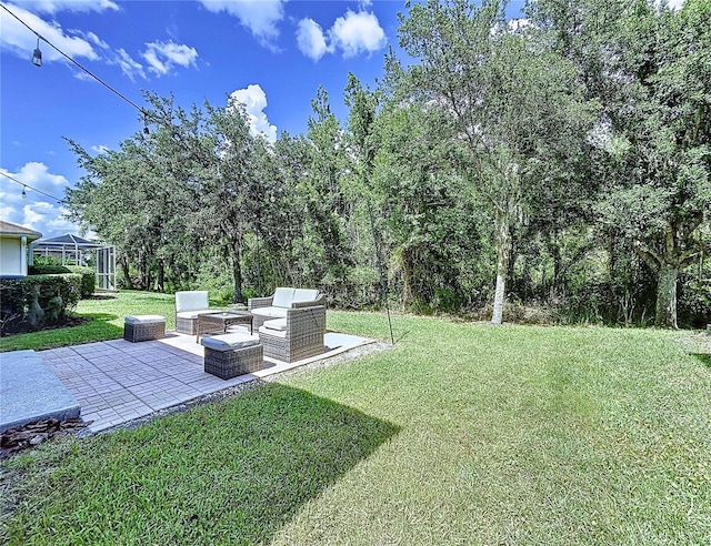 4116 Knollpoint Dr, Wesley Chapel, FL 33544 - view of green lawn featuring a patio and an outdoor living space