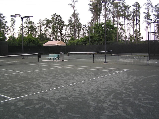 4116 Knollpoint Dr, Wesley Chapel, FL 33544 - view of tennis court featuring community basketball court