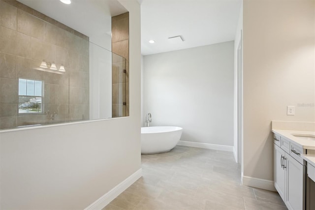 14523 Swiss Bridge Dr, Lithia, FL 33547 - full bath featuring vanity, walk in shower, a freestanding bath, and recessed lighting
