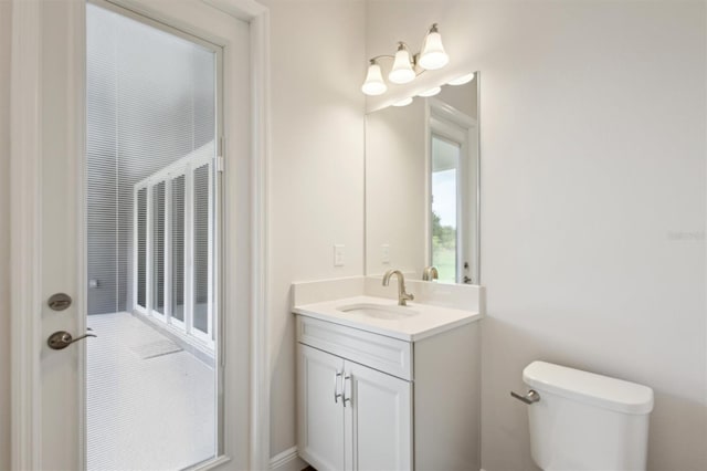 14523 Swiss Bridge Dr, Lithia, FL 33547 - bathroom featuring toilet and vanity