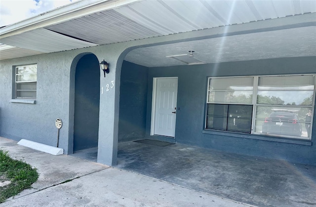 121 Granada Blvd, North Port, FL 34287 - view of exterior entry with stucco siding