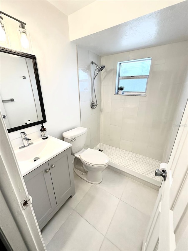 121 Granada Blvd, North Port, FL 34287 - full bath featuring vanity, tiled shower, and tile patterned flooring