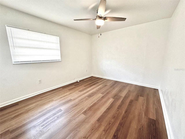 121 Granada Blvd, North Port, FL 34287 - empty room with ceiling fan and wood finished floors