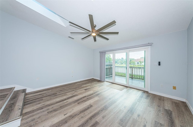 6206 92nd Pl N Unit 3605, Pinellas Park, FL 33782 - unfurnished room featuring a ceiling fan, wood finished floors, and lofted ceiling