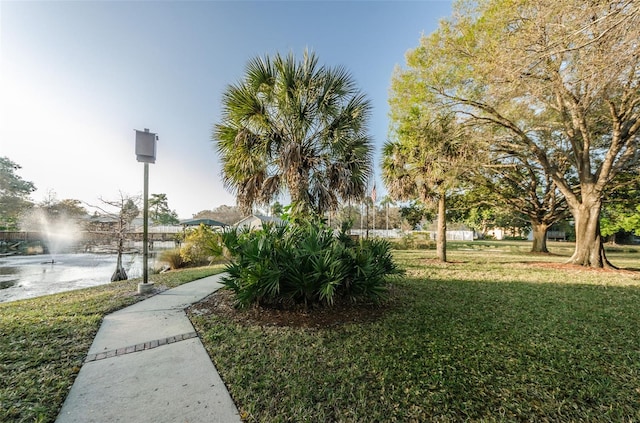 6206 92nd Pl N Unit 3605, Pinellas Park, FL 33782 - view of home's community featuring a lawn and a water view