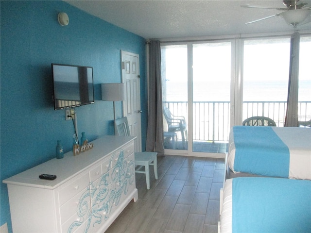 9980 Gulf Blvd Unit 408, Treasure Island, FL 33706 - living area with ceiling fan