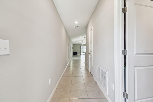 9437 Lemon Drop Loop, Sun City Center, FL 33573 - corridor featuring light tile patterned flooring and recessed lighting