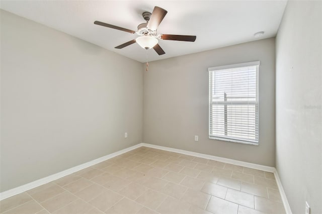 9437 Lemon Drop Loop, Sun City Center, FL 33573 - spare room featuring a ceiling fan, light tile patterned floors, and a smoke detector