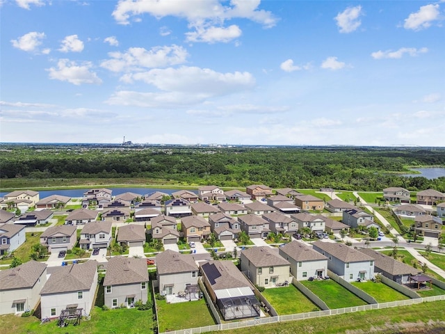 9437 Lemon Drop Loop, Sun City Center, FL 33573 - aerial view of residential area featuring a nearby body of water