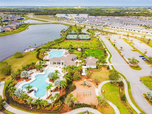 9437 Lemon Drop Loop, Sun City Center, FL 33573 - drone / aerial view of a pool and a large body of water