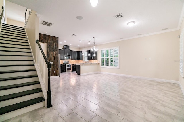 9349 Mira Valle Ln, Winter Garden, FL 34787 - unfurnished living room featuring stairs, ornamental molding, and a chandelier