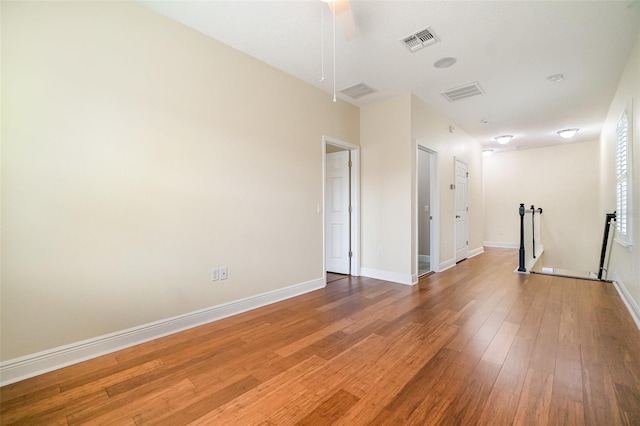 9349 Mira Valle Ln, Winter Garden, FL 34787 - unfurnished room featuring wood-type flooring and attic access