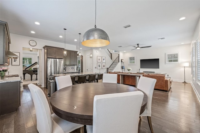 311 12th Ave N, Saint Petersburg, FL 33701 - dining area featuring stairway, a ceiling fan, recessed lighting, and dark wood-style flooring