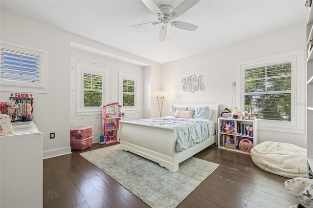 311 12th Ave N, Saint Petersburg, FL 33701 - bedroom featuring multiple windows, dark wood-style floors, and a ceiling fan