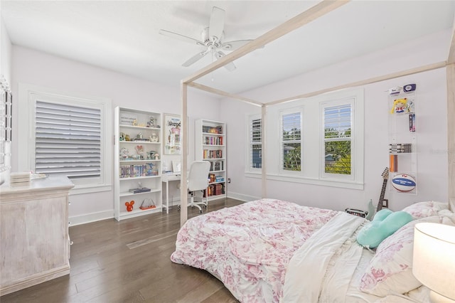 311 12th Ave N, Saint Petersburg, FL 33701 - bedroom featuring dark wood-style flooring and ceiling fan