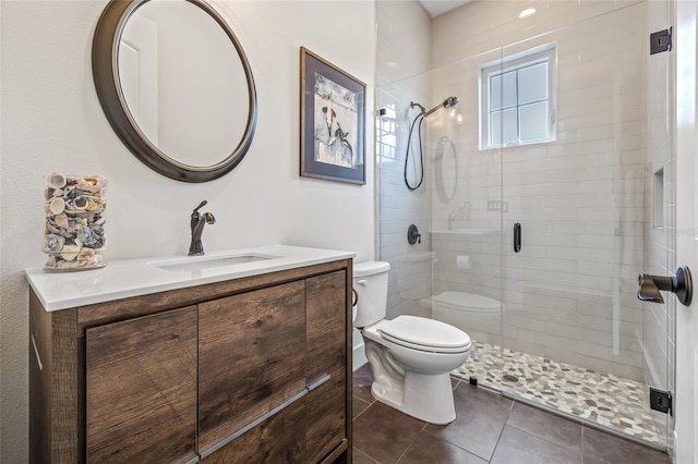 311 12th Ave N, Saint Petersburg, FL 33701 - full bathroom featuring a stall shower, vanity, and tile patterned floors
