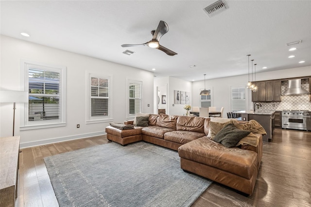 311 12th Ave N, Saint Petersburg, FL 33701 - living room featuring dark wood-style floors, recessed lighting, and a ceiling fan