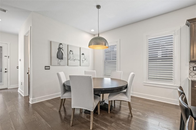 311 12th Ave N, Saint Petersburg, FL 33701 - dining space featuring dark wood-type flooring and recessed lighting