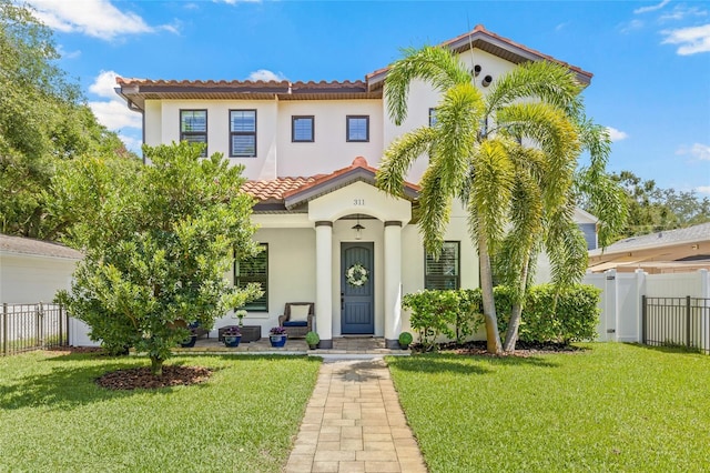 311 12th Ave N, Saint Petersburg, FL 33701 - mediterranean / spanish-style home with a tile roof and stucco siding