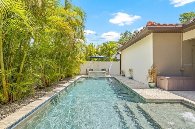 311 12th Ave N, Saint Petersburg, FL 33701 - view of swimming pool with a patio area