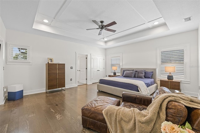 311 12th Ave N, Saint Petersburg, FL 33701 - bedroom with a raised ceiling, dark wood-style floors, recessed lighting, and a ceiling fan
