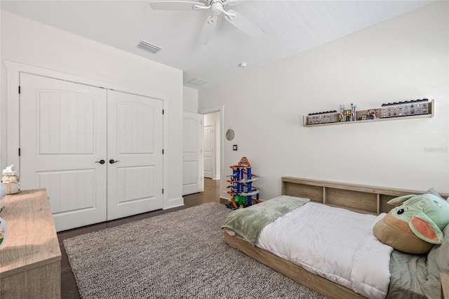 311 12th Ave N, Saint Petersburg, FL 33701 - bedroom featuring a closet, wood finished floors, and ceiling fan
