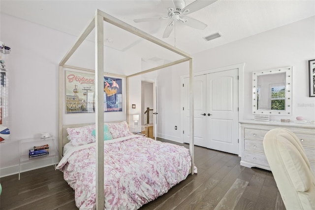 311 12th Ave N, Saint Petersburg, FL 33701 - bedroom featuring dark wood-style floors, a closet, and a ceiling fan