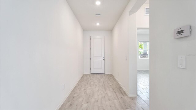 14424 59th Cir E, Bradenton, FL 34211 - corridor with light wood-style floors and recessed lighting